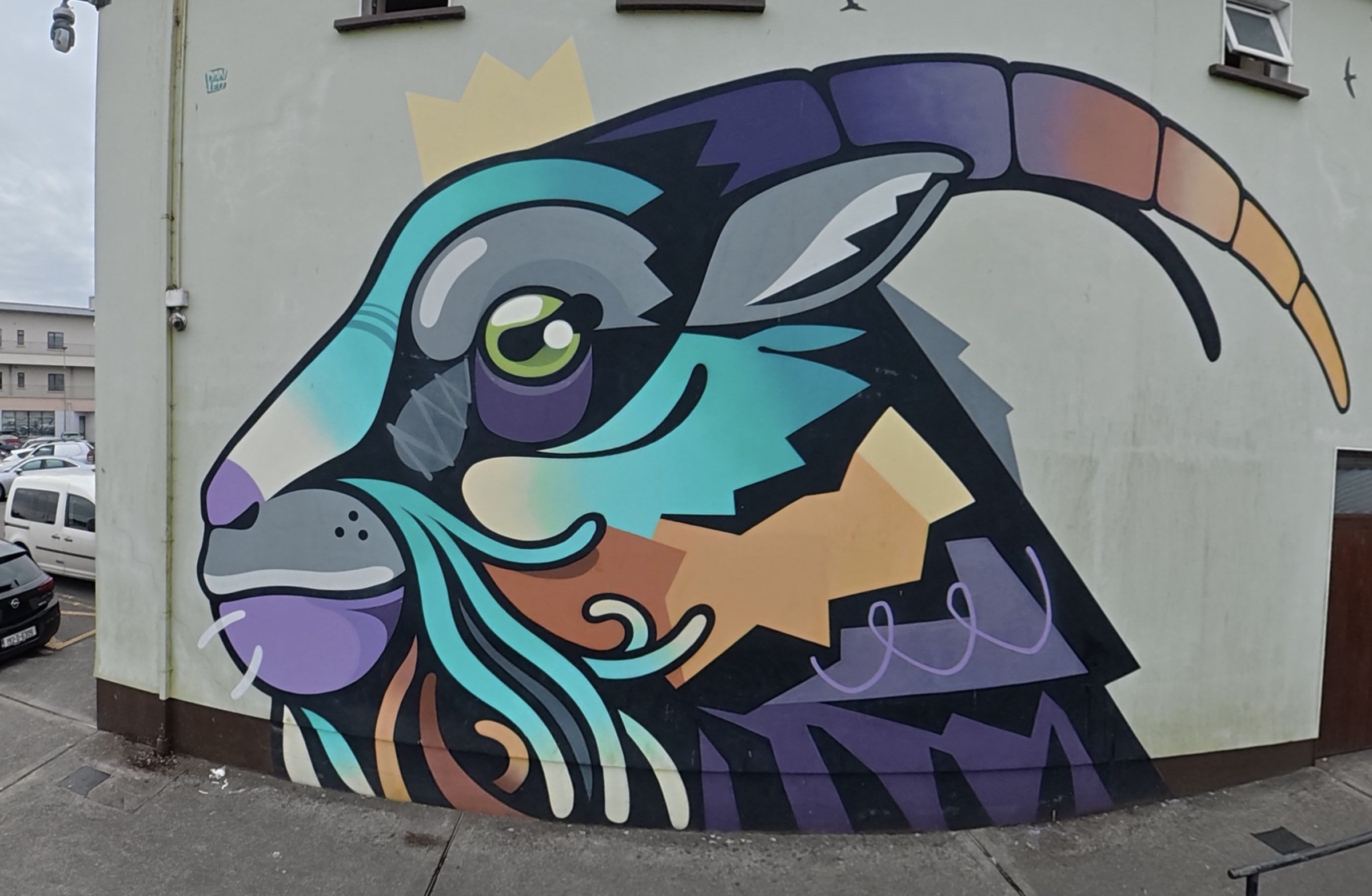 A colourful geometric goat mural in Killorglin