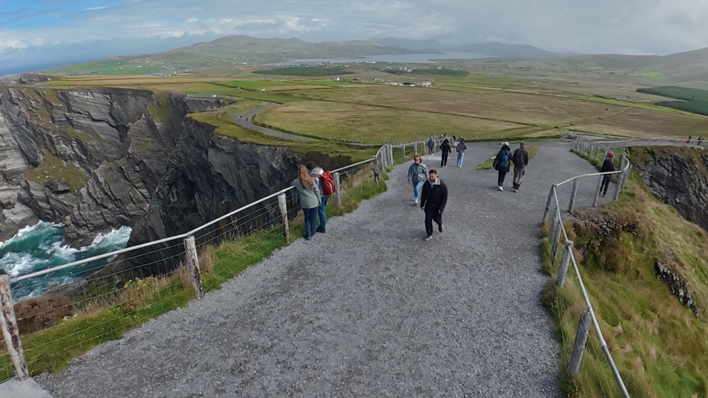 Steep gravel walkways crossing the clifftops at Kerry Cliffs