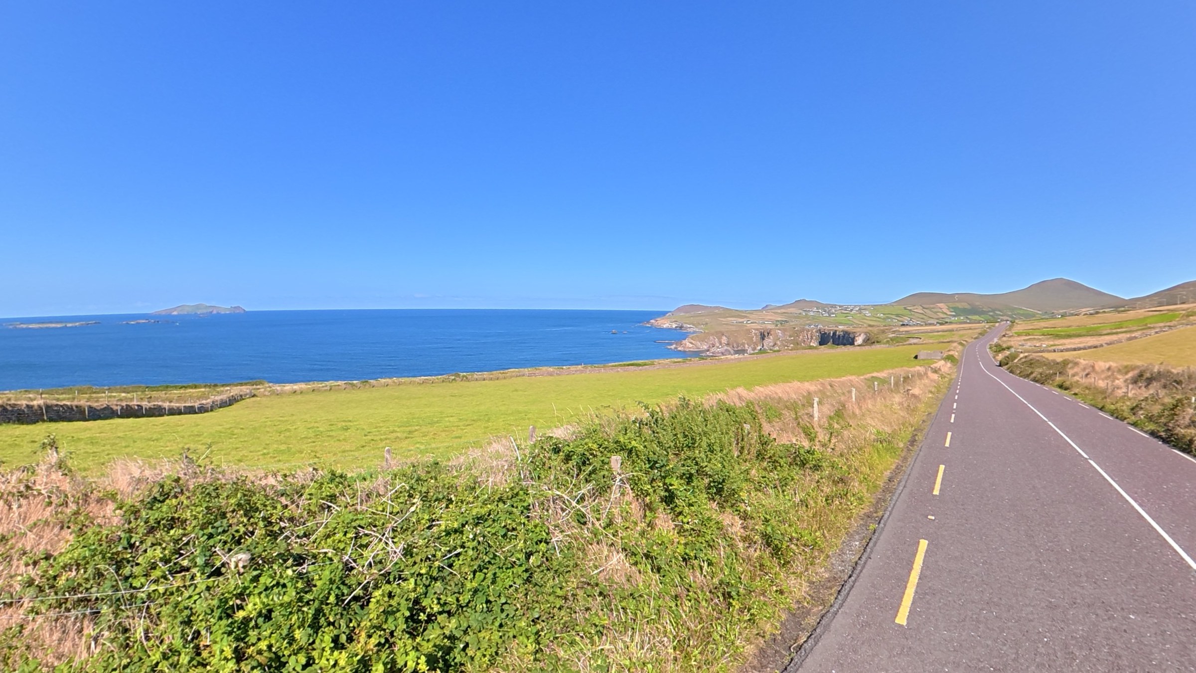 The narrow Slea Head road running above the Atlantic