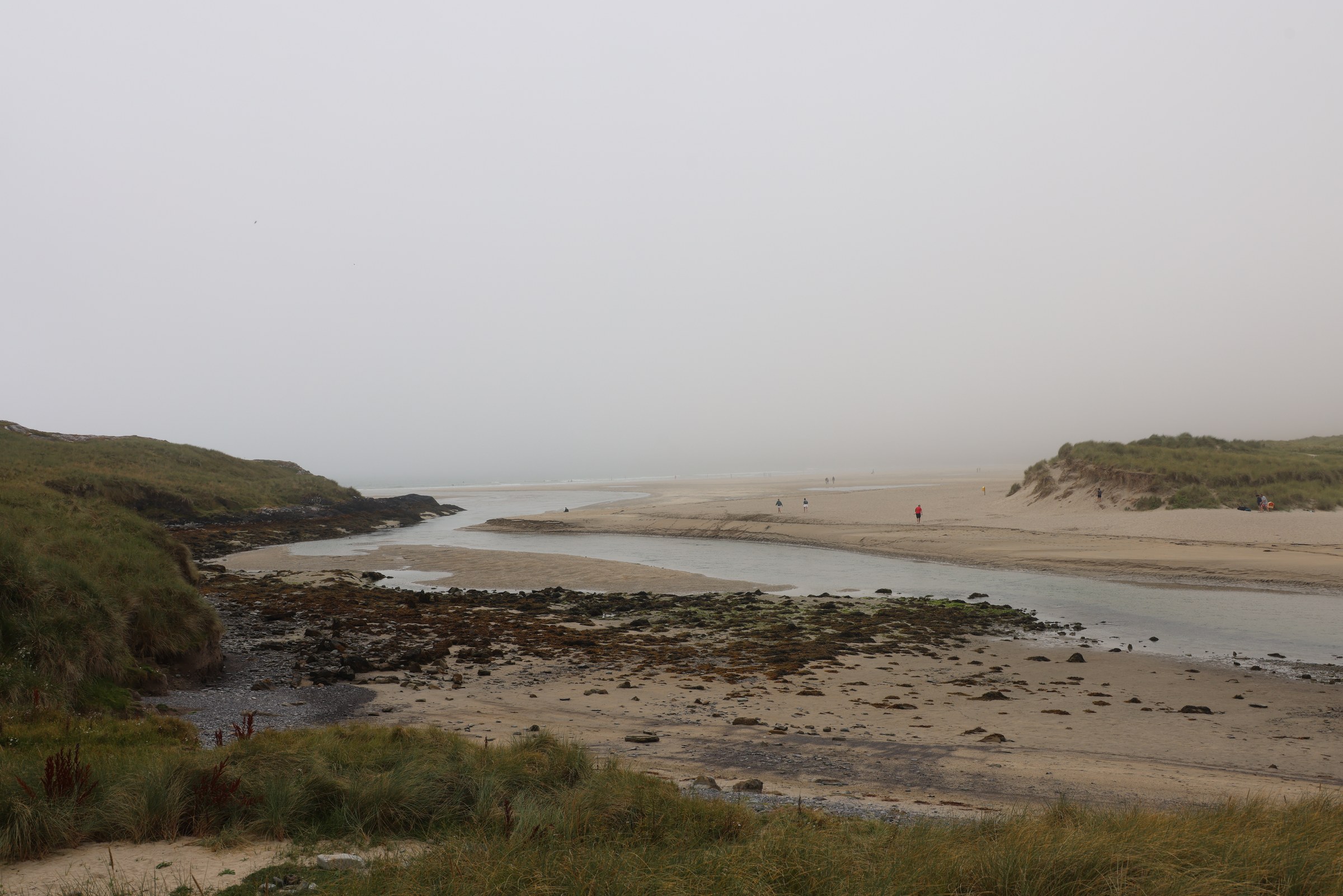 Barleycove Beach and its dunes beneath low cloud