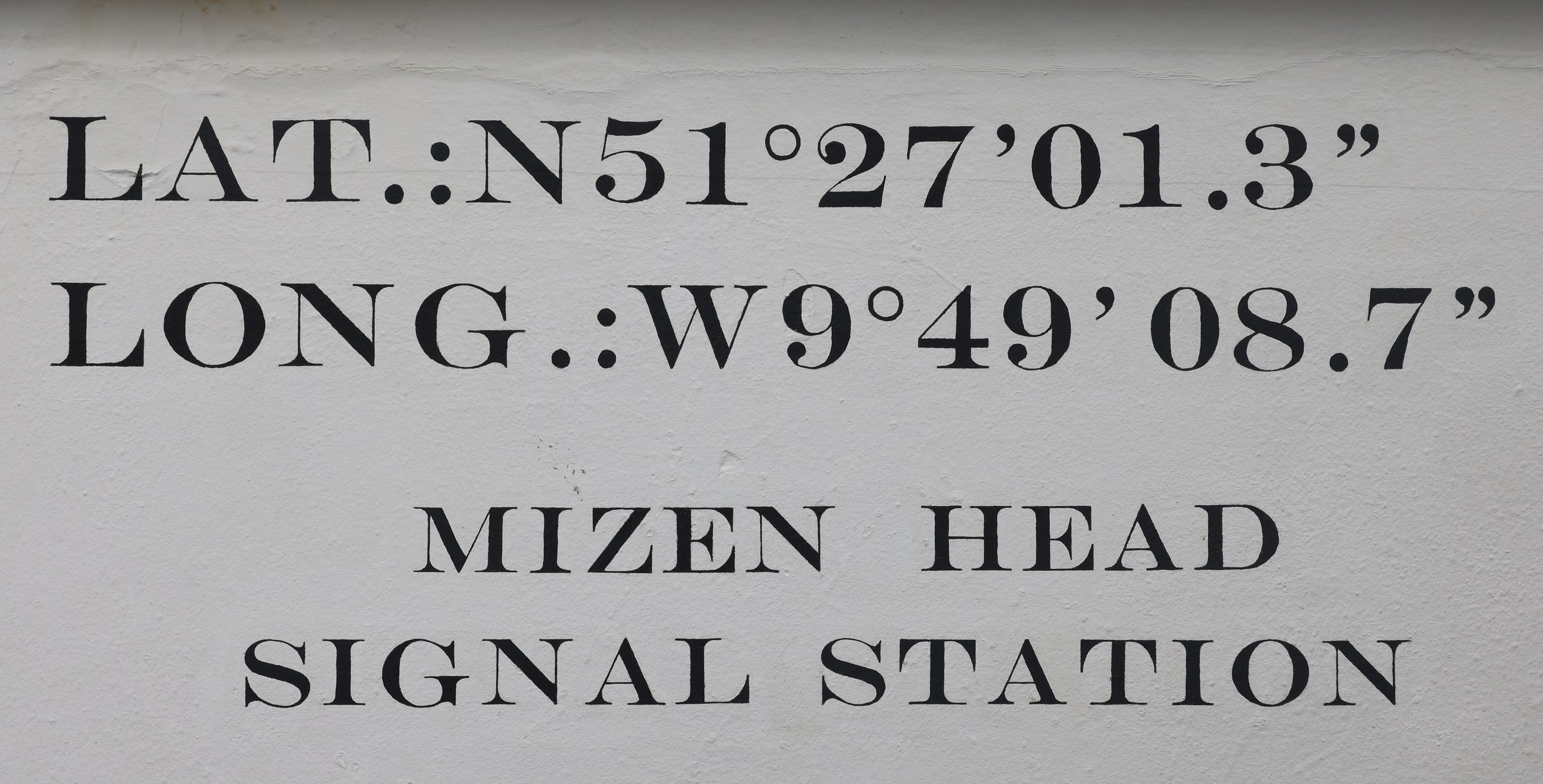 Plaque marking the coordinates of Mizen Head Signal Station