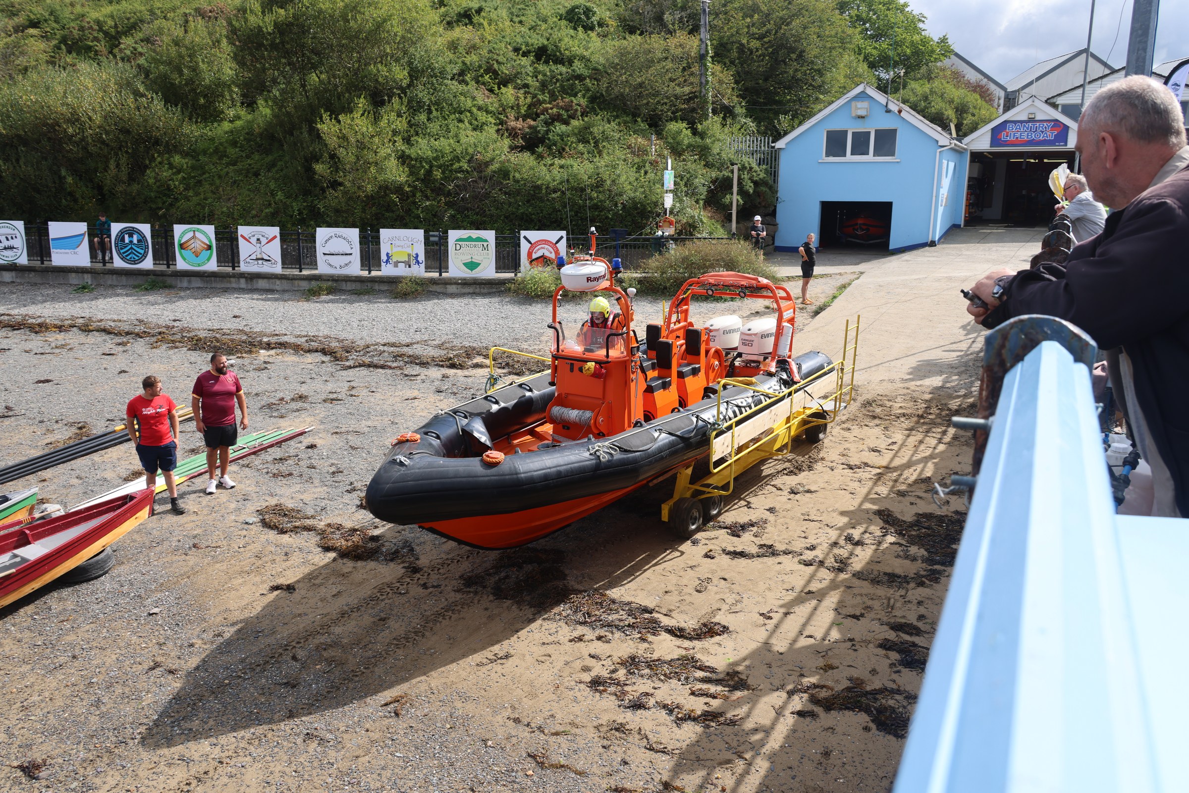Bantry's orange inshore lifeboat descending the slipway