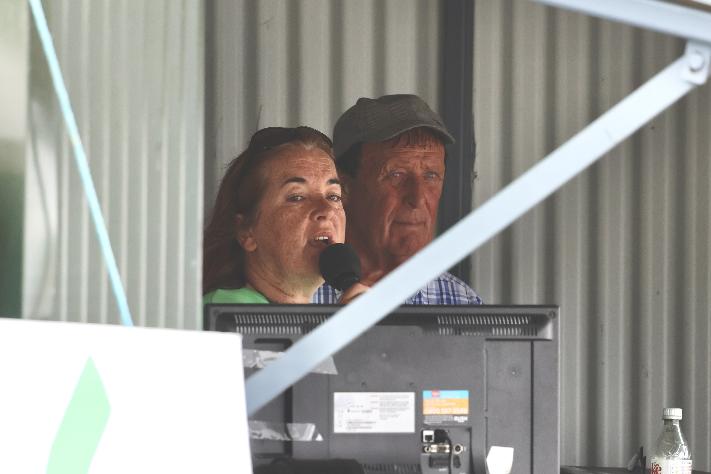 The event announcer speaking from the commentary booth