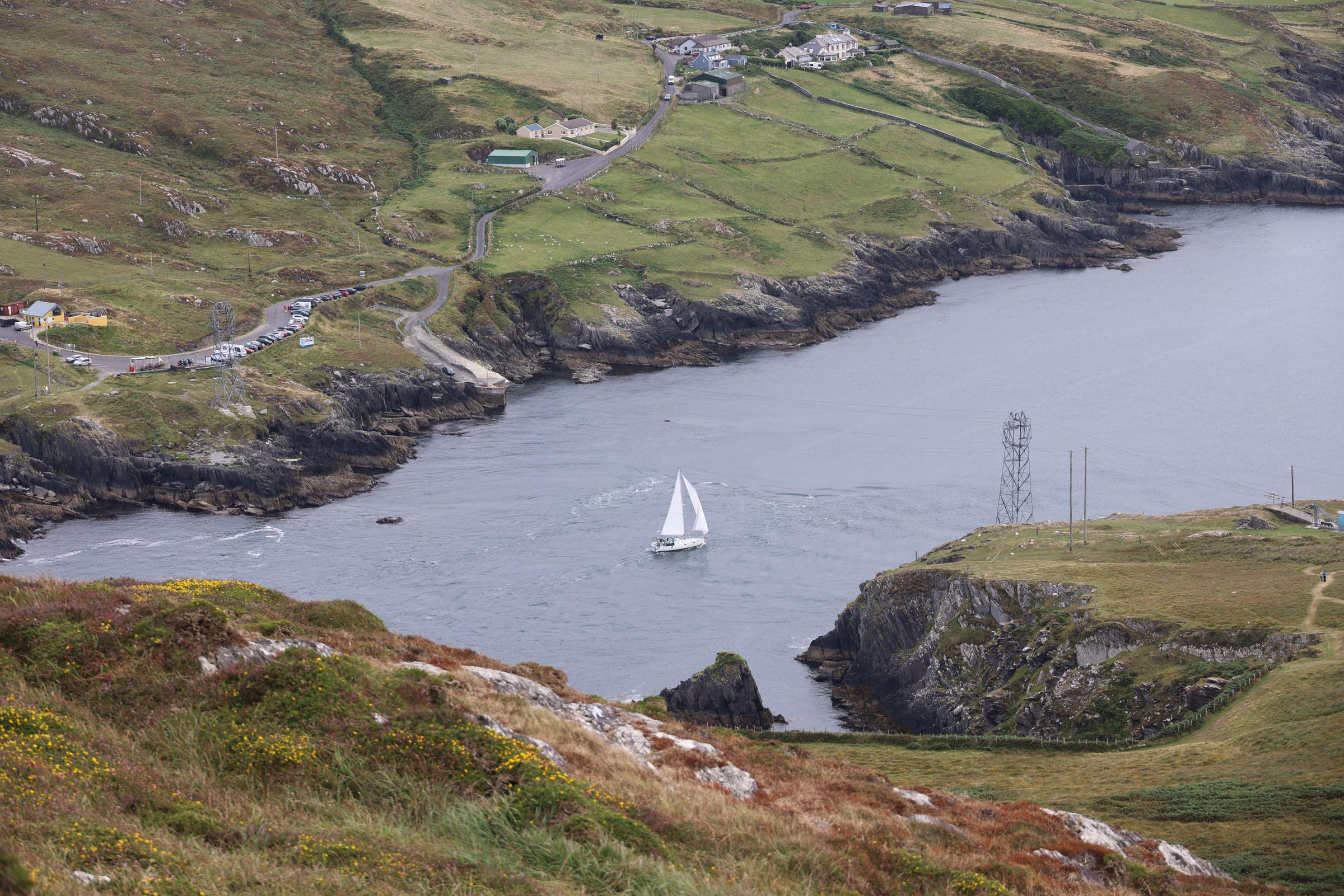 Dursey Sound, its cable-car wires and the mainland car park from the hillside