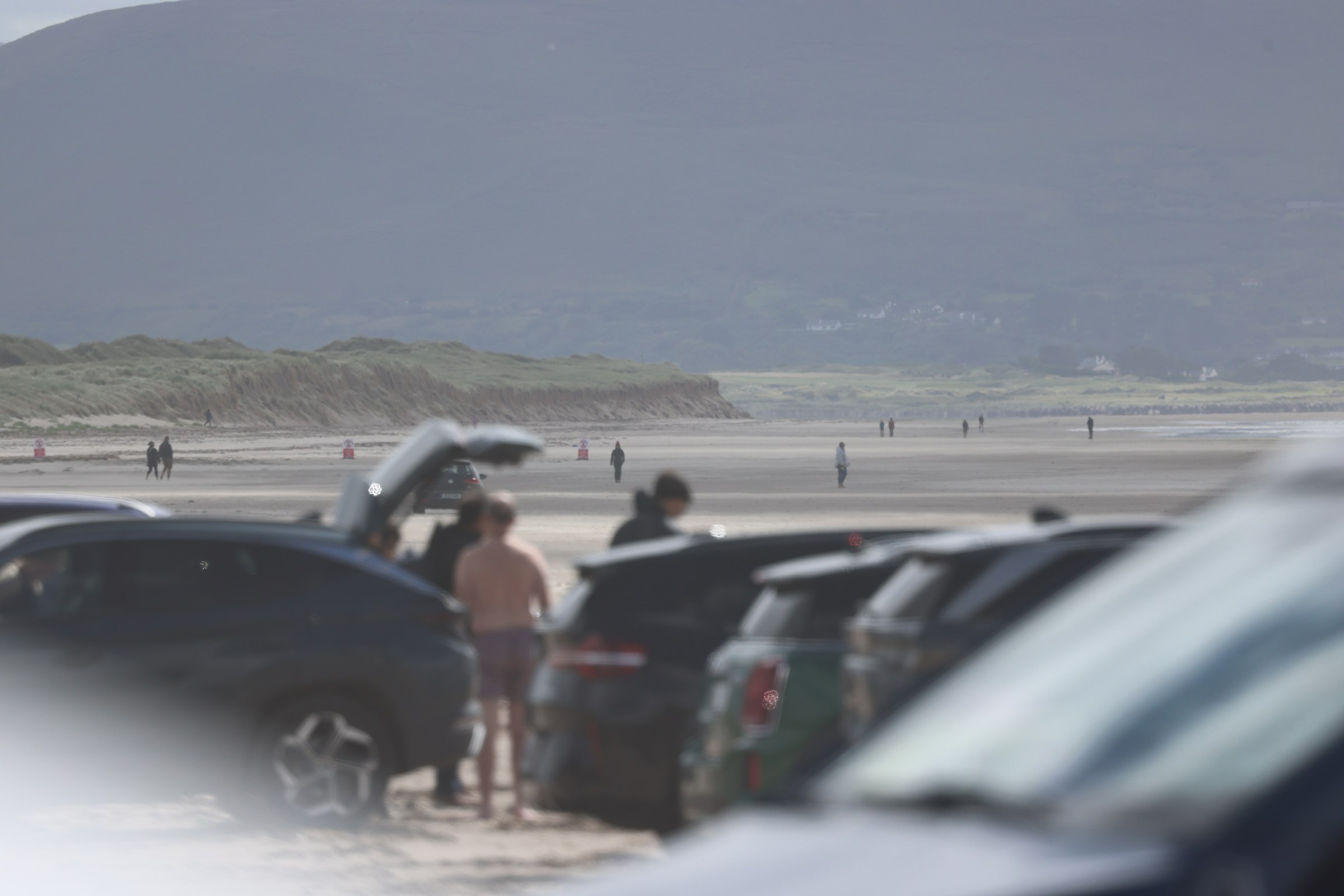 Sue appearing as a tiny figure in the middle of the vast Inch Beach