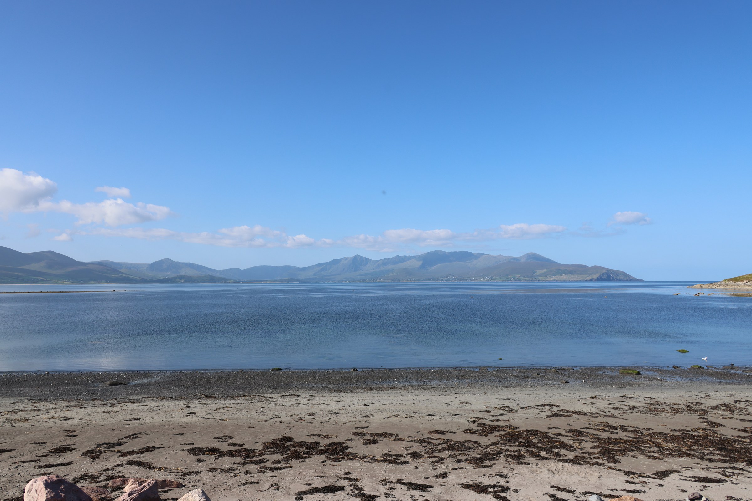 The mountains of the Dingle Peninsula seen across the water from the Maharees
