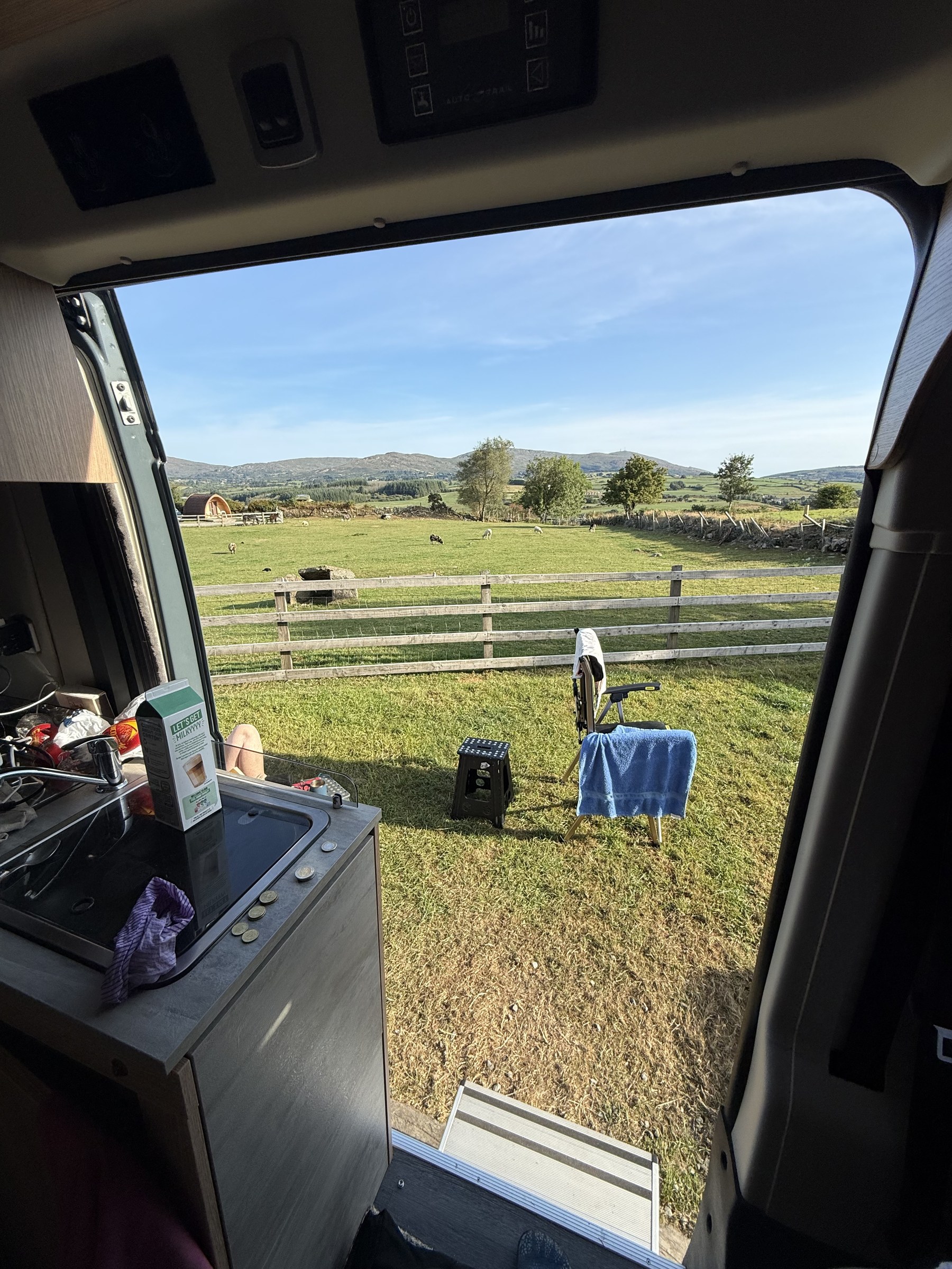 Morning view through the campervan door at Top of the Rock