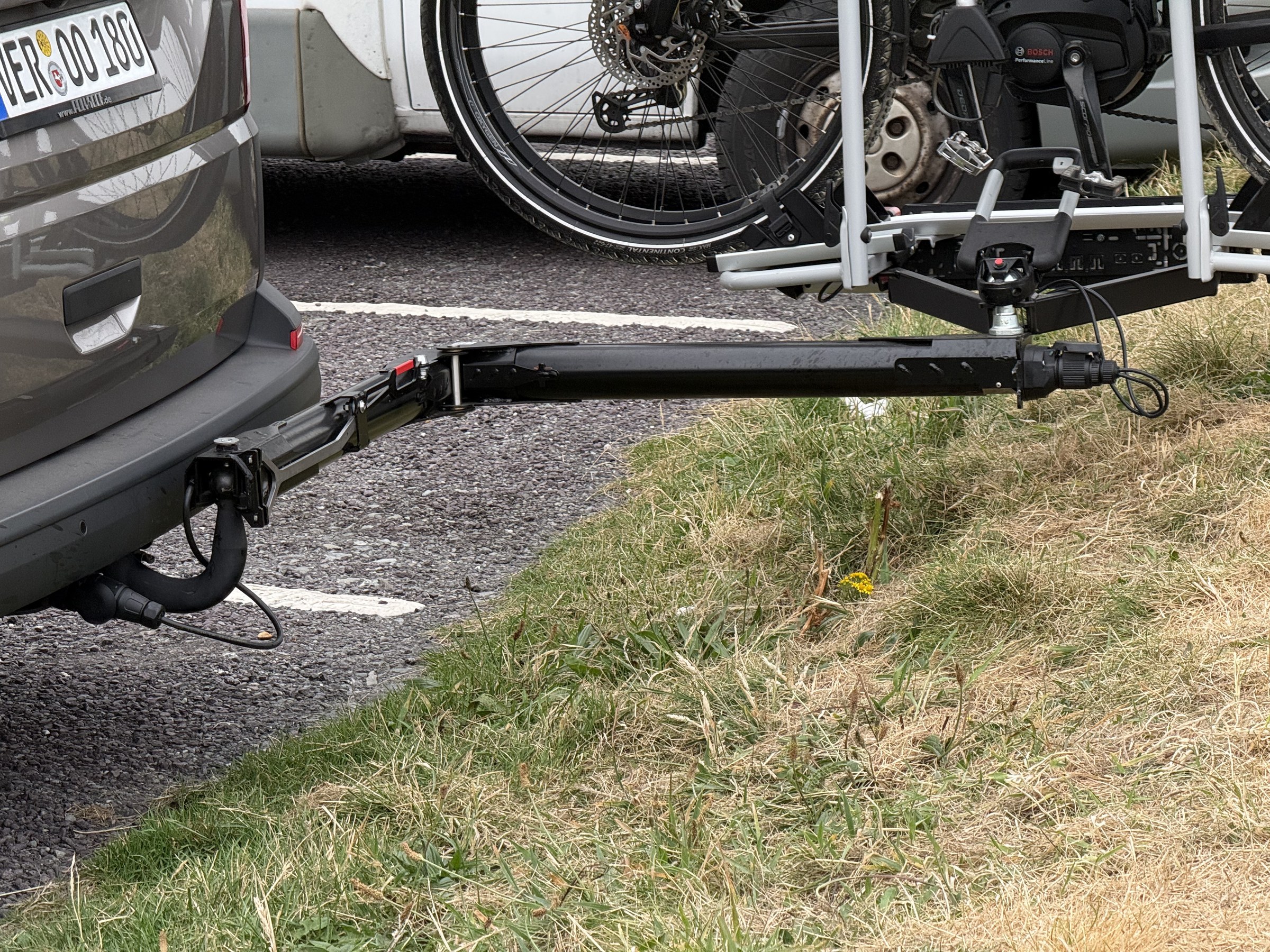 Space Maker swing-away arm fitted beneath a campervan bike rack