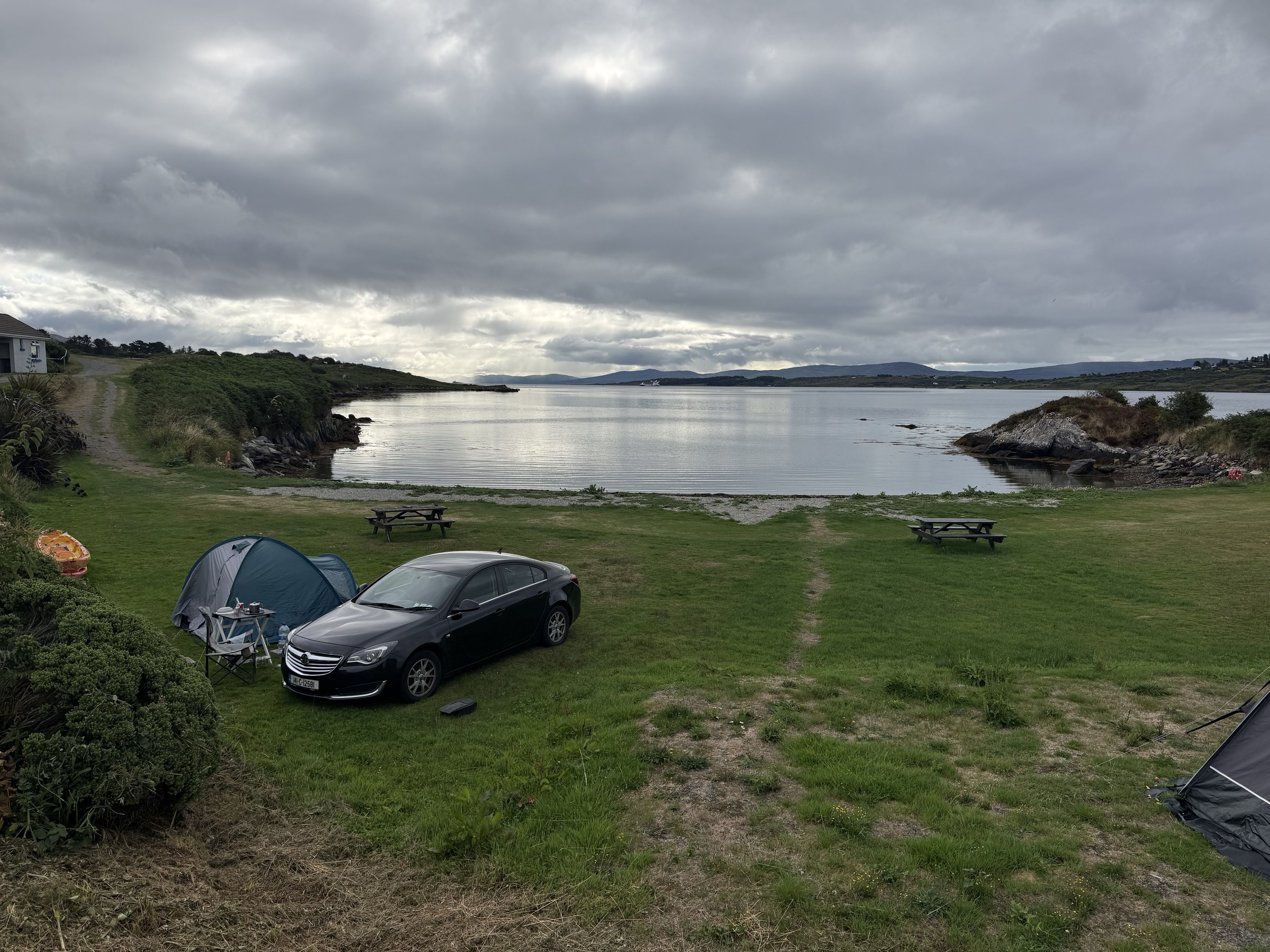 Roy's tent and car beside the shore at Berehaven Golf Club