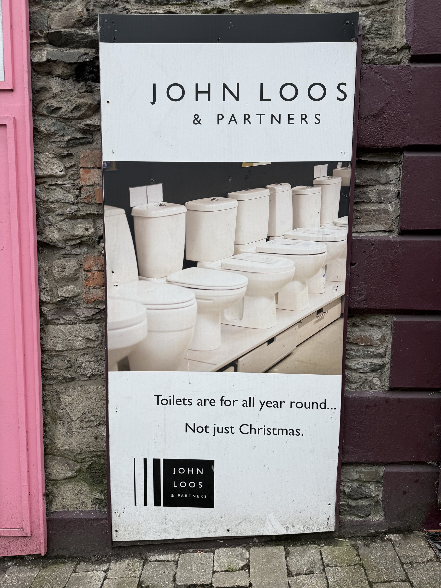 John Loos and Partners toilet advertisement in Killorglin