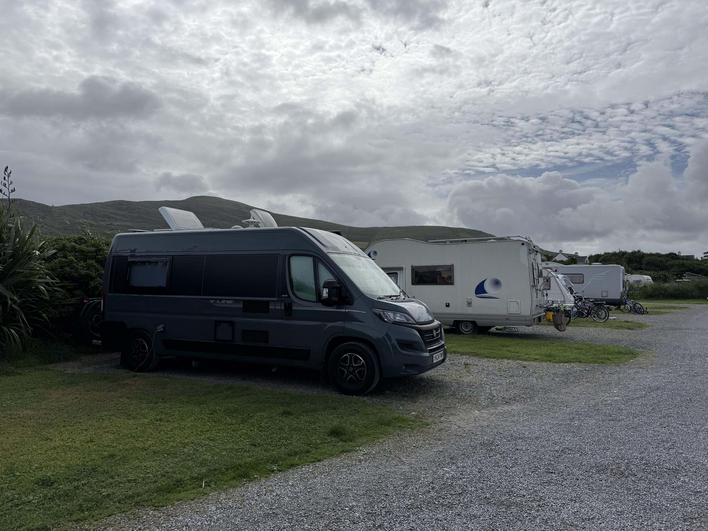 Ollie parked at Mannix Point campsite beneath a grey sky