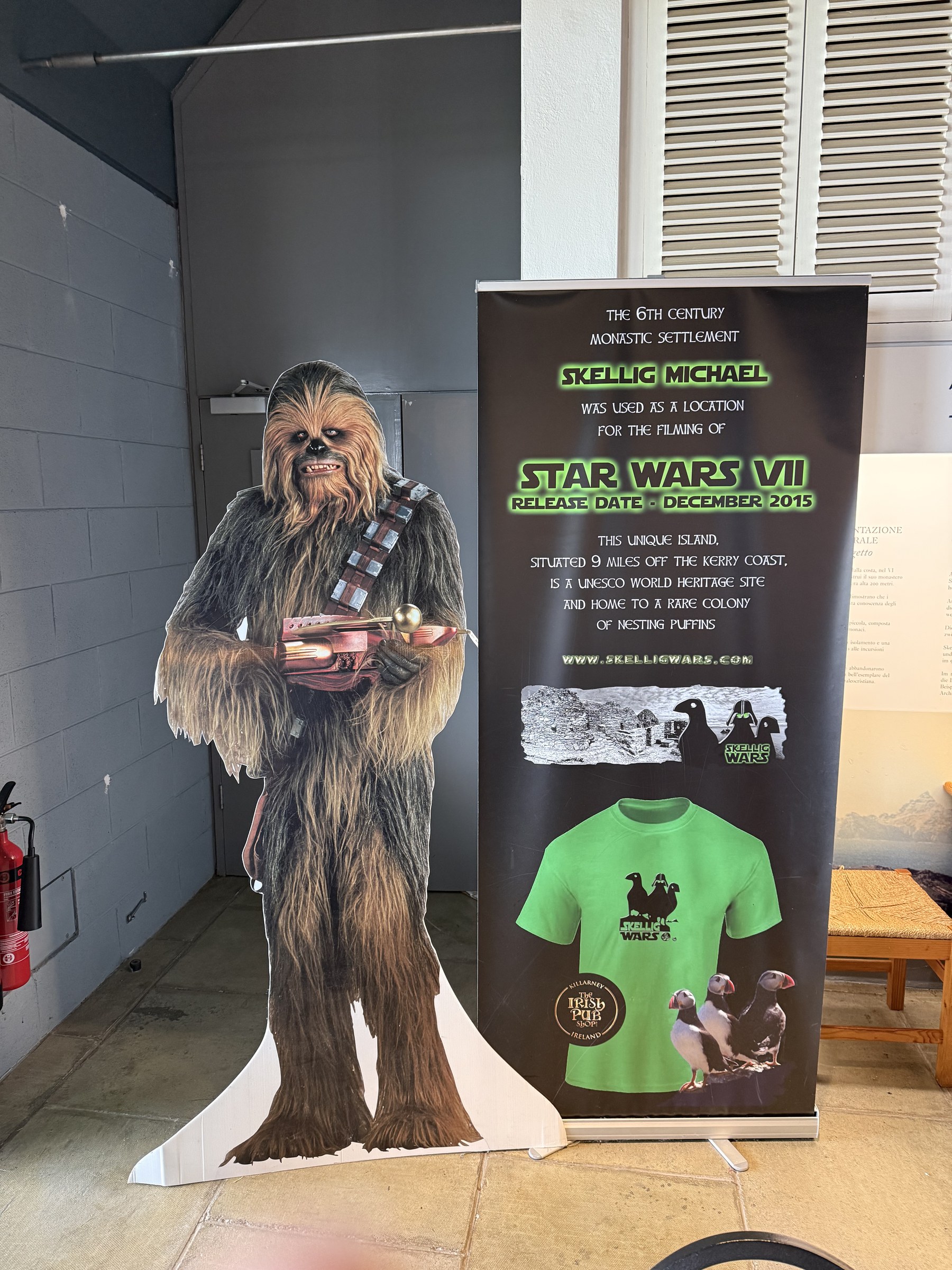 A life-size Chewbacca cut-out beside a Skellig Michael Star Wars display
