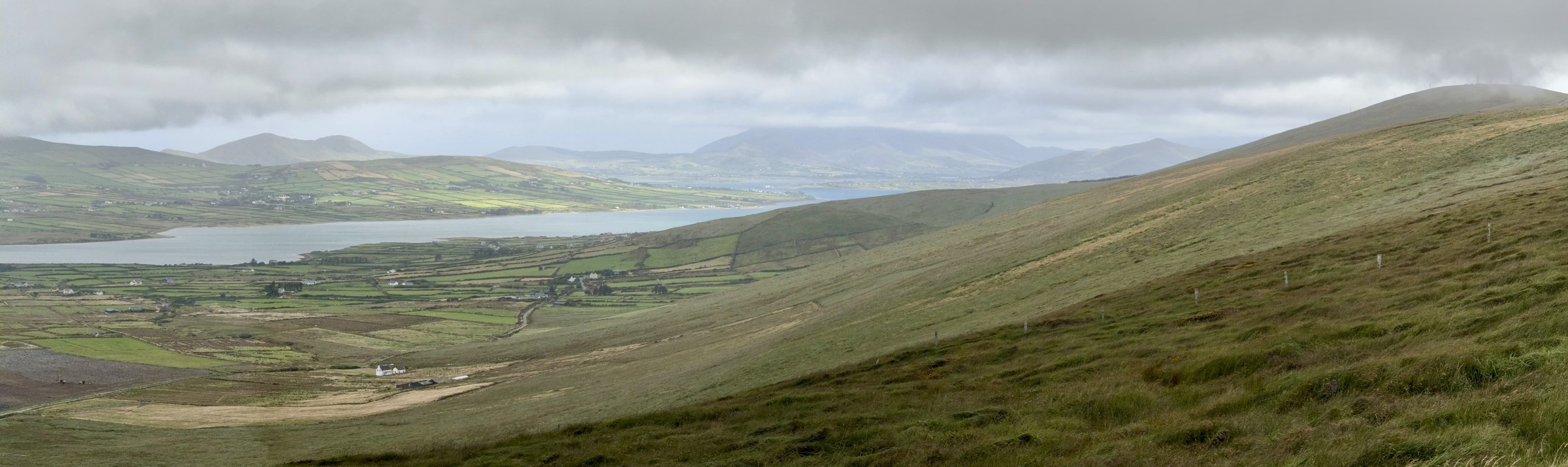 A panoramic view towards Portmagee and Valentia Island from Coomanaspig Pass