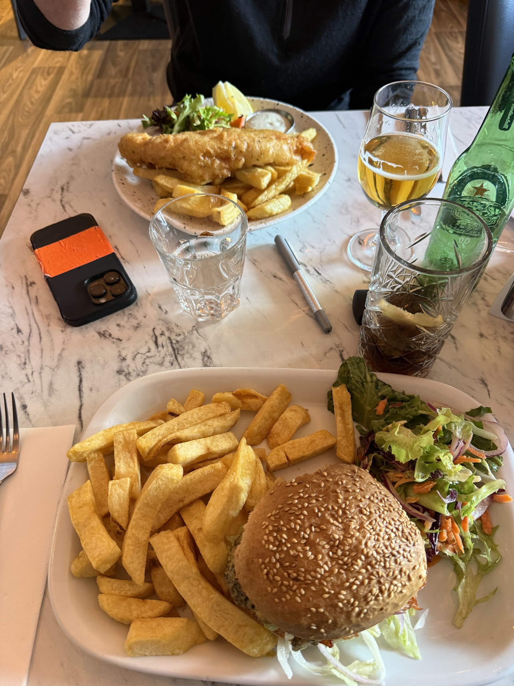 A gluten-free burger and fish and chips on the table at The Fish Box