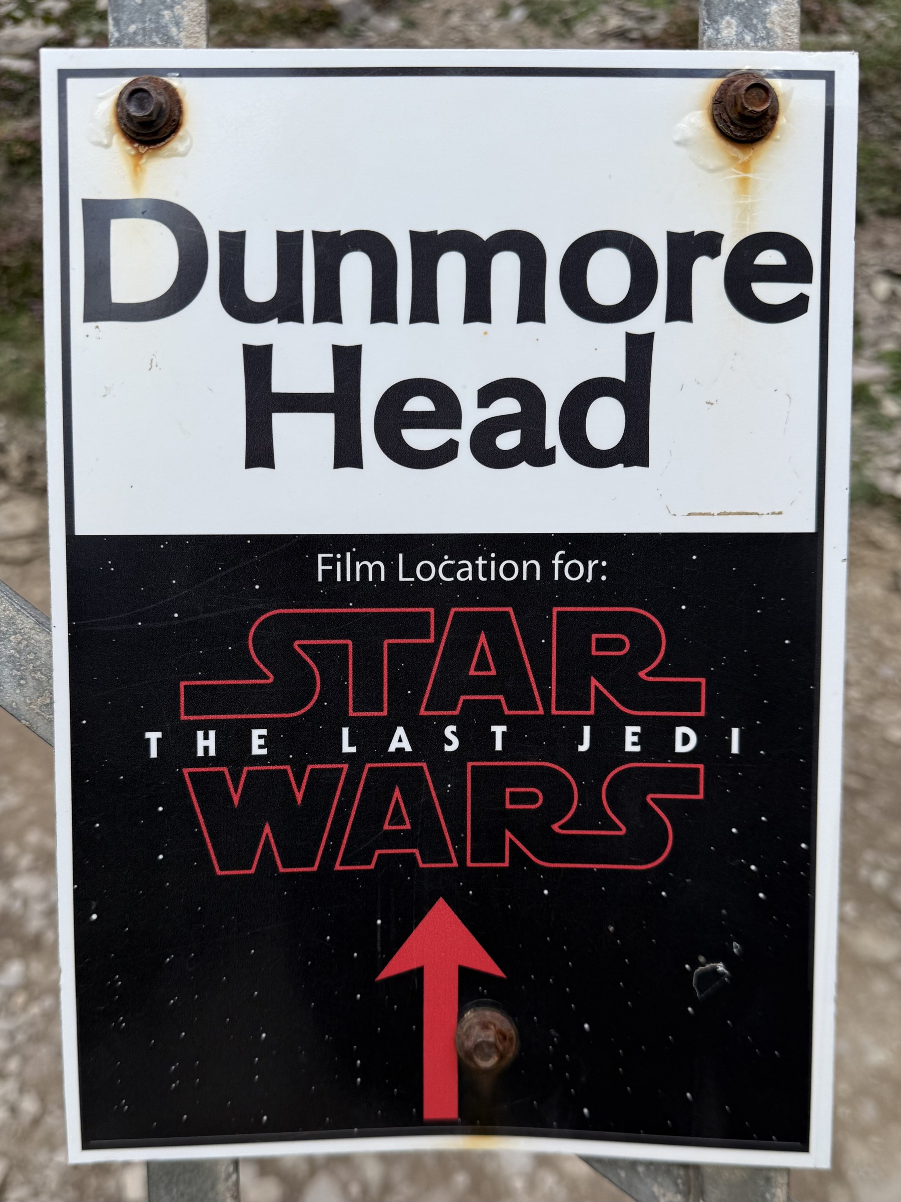 A sign identifying Dunmore Head as a filming location for Star Wars: The Last Jedi