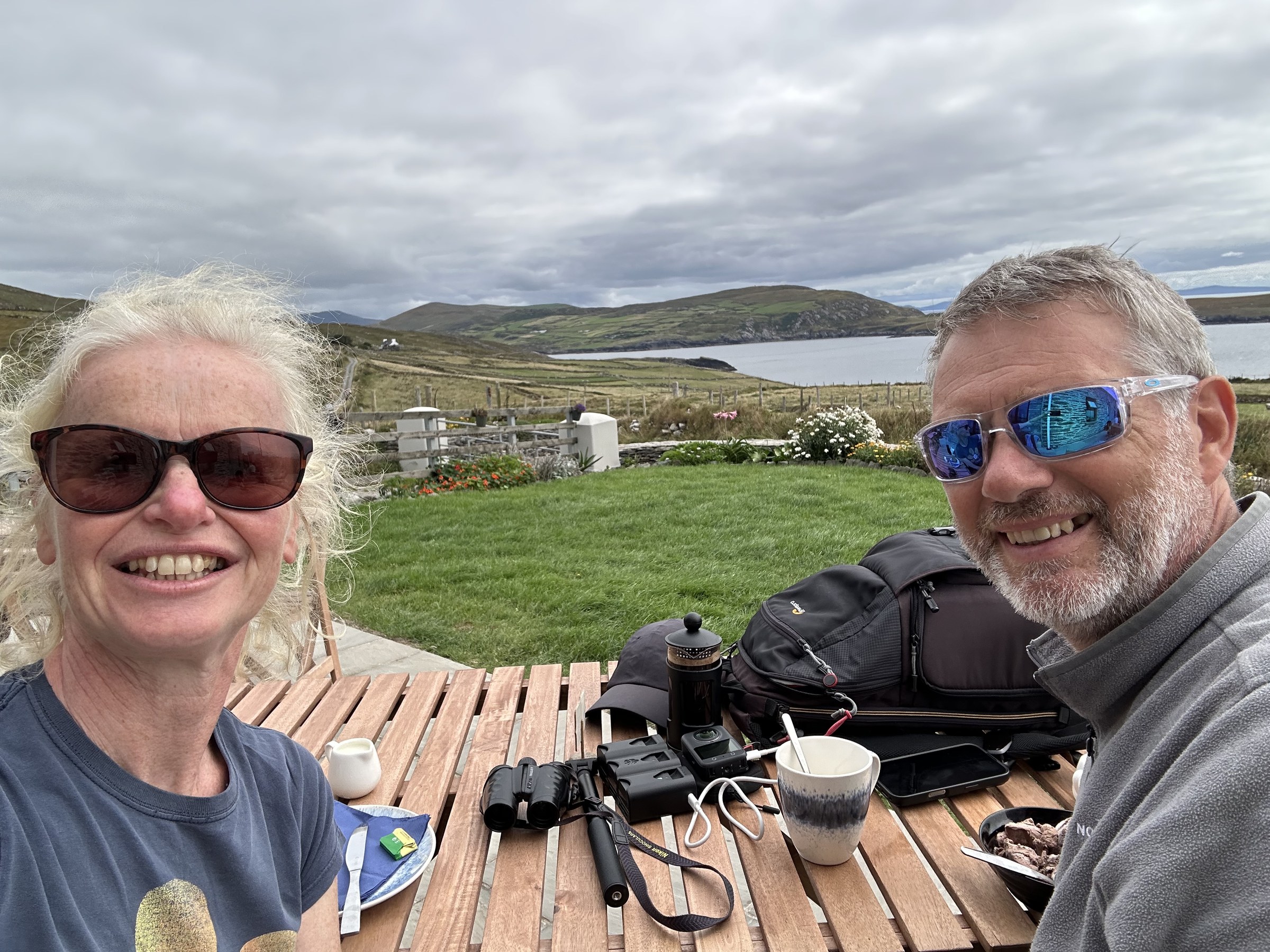 John and Sue enjoying drinks outside Kilmichael Cottage