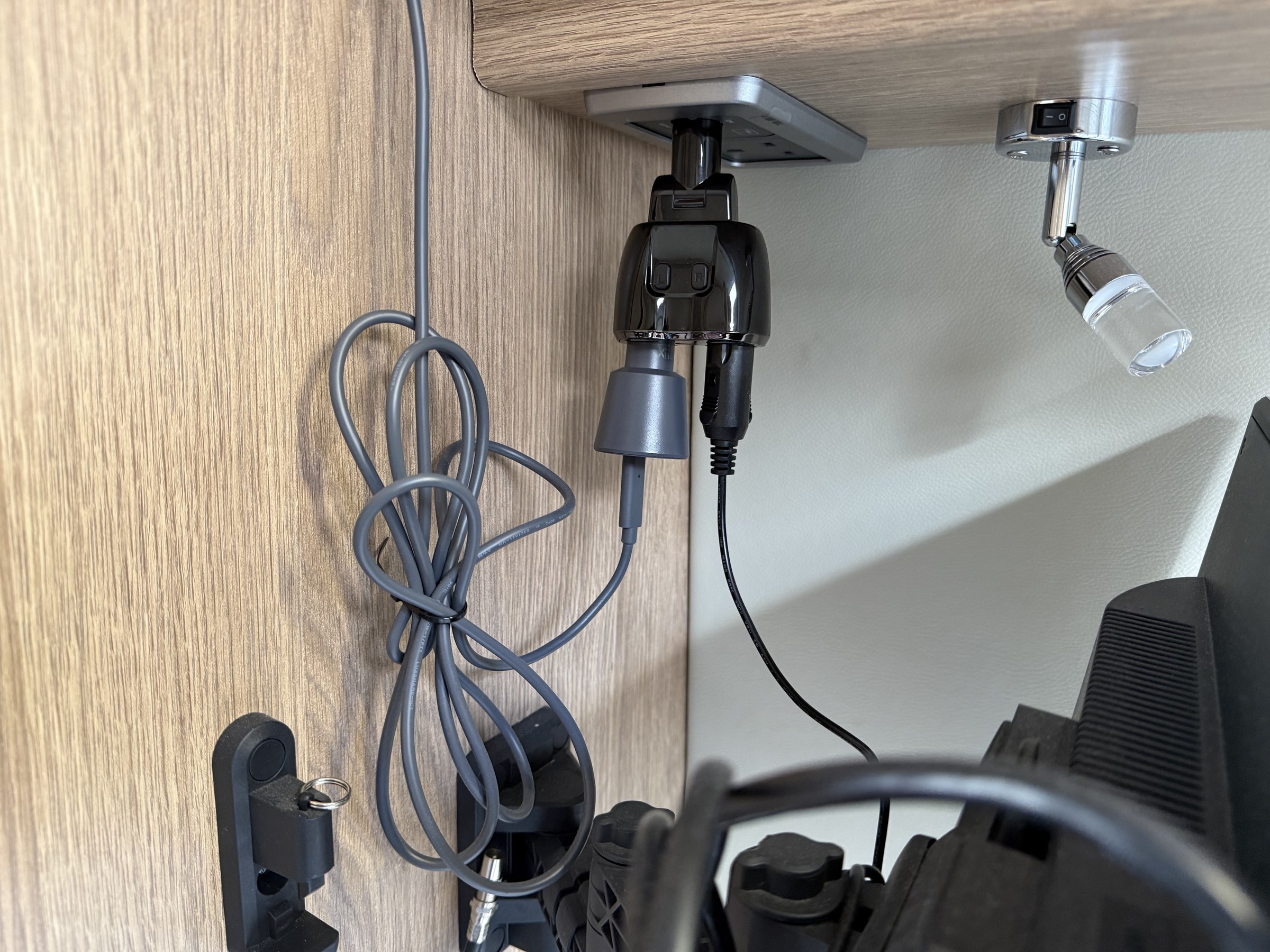 The two 12-volt plugs used to power Starlink and the television