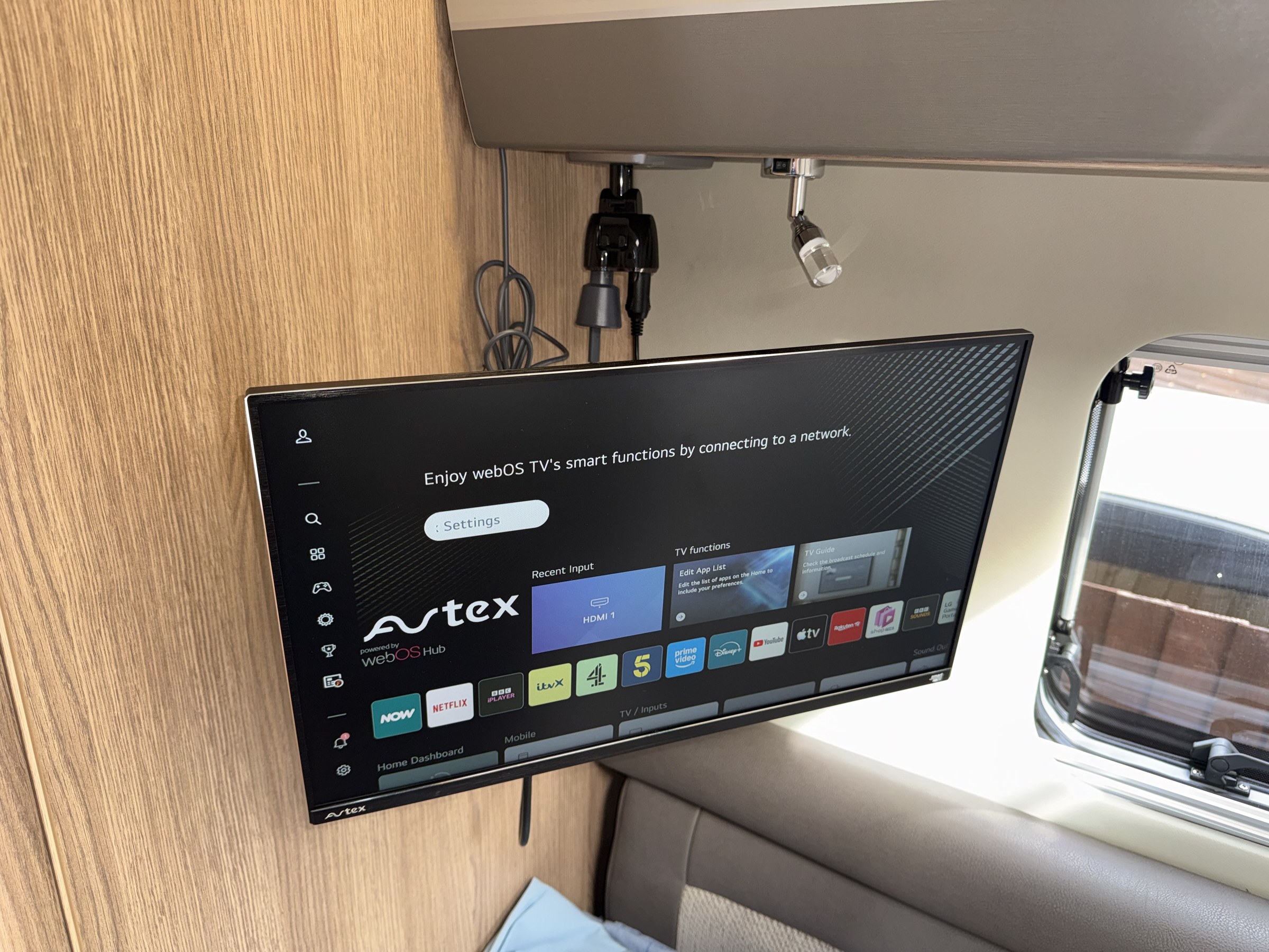 The factory-fitted television switched on inside Ollie-II