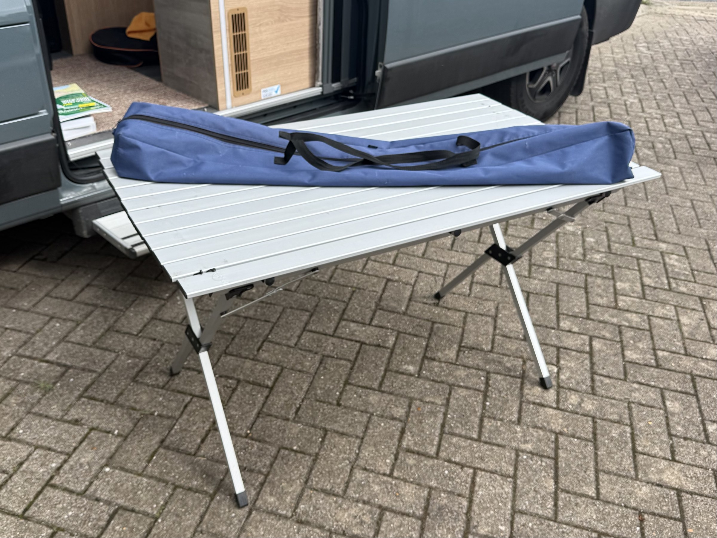 Our old aluminium concertina camping table