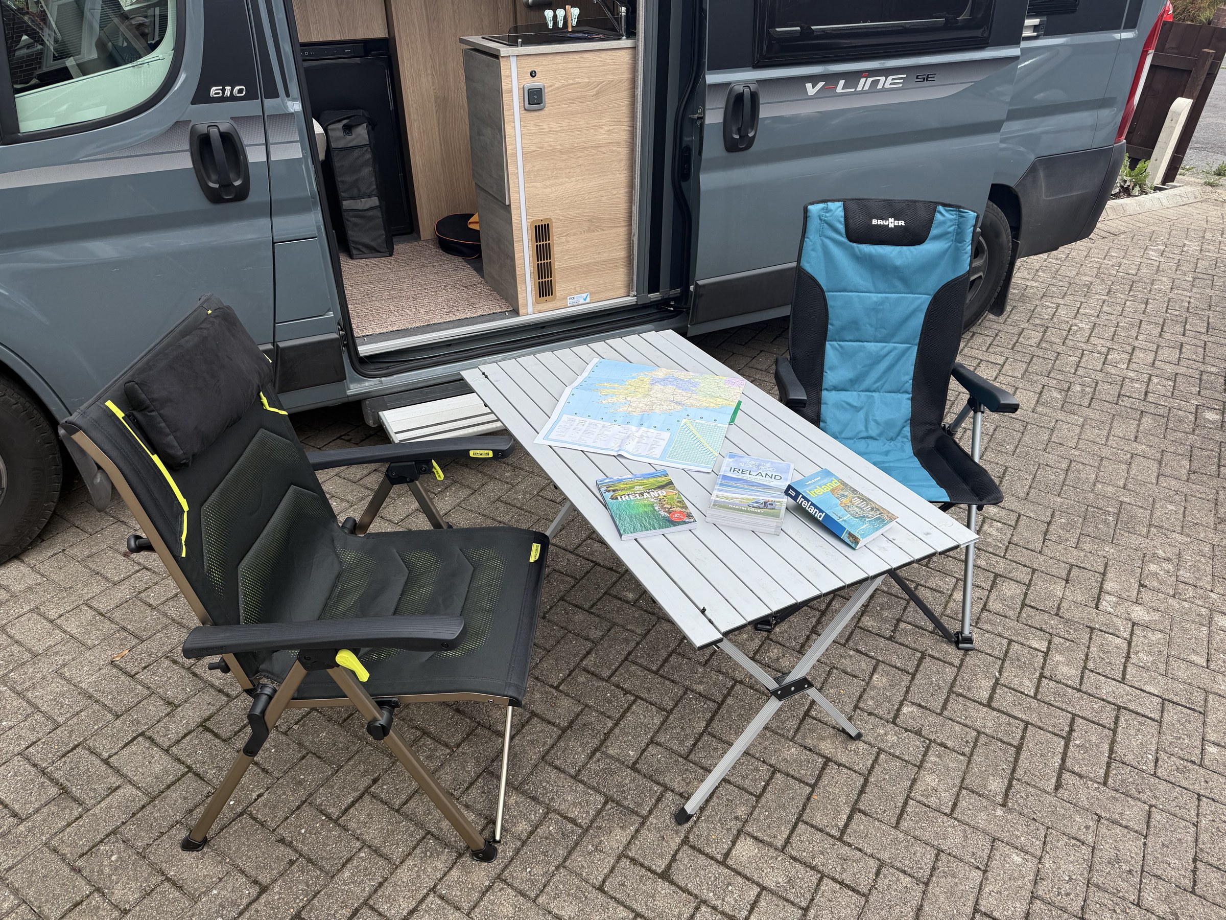 Our outdoor table and chairs set up beside Ollie-II