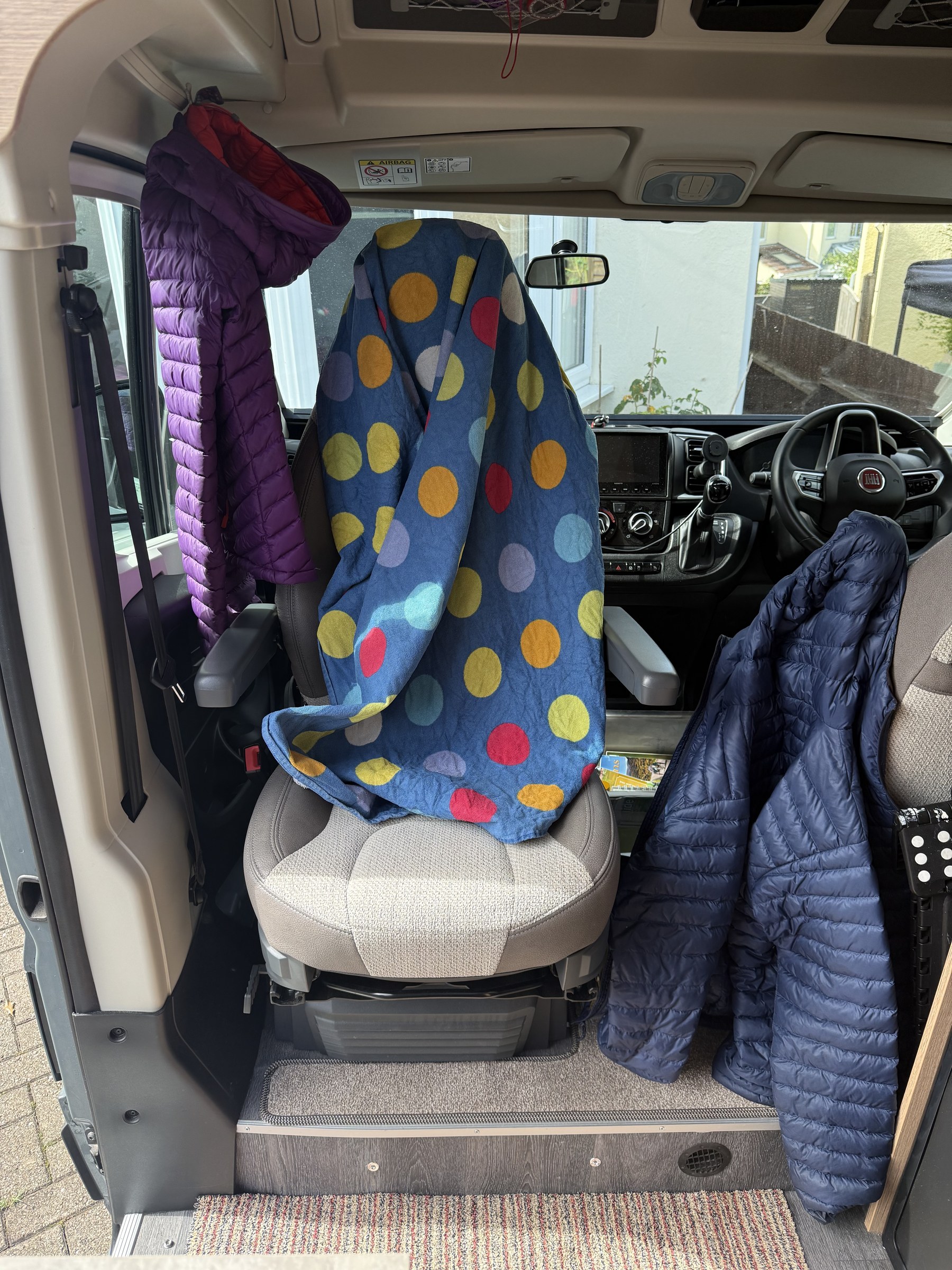 We ended up hanging towels and coats all over the van